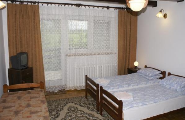 Pensjonacik Albatros Apartamento Mikołajki Quarto foto