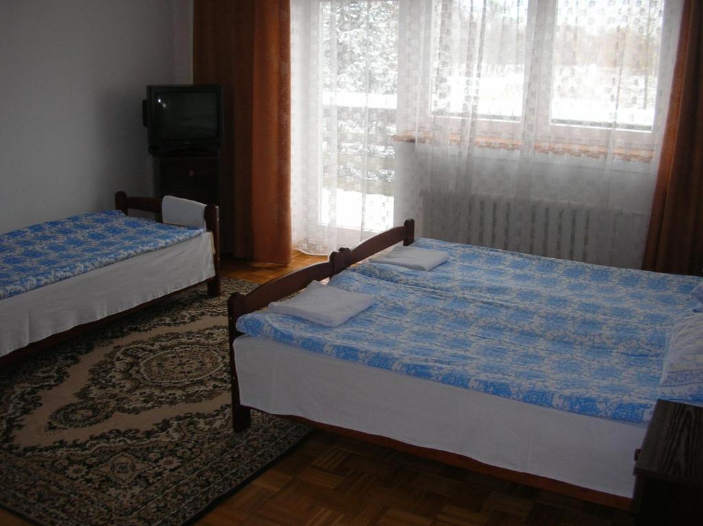 Pensjonacik Albatros Apartamento Mikołajki Quarto foto